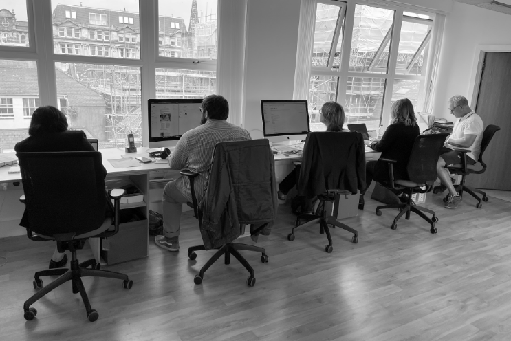 Team working together at their desks